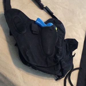 Tactical concealed carry shoulder bag